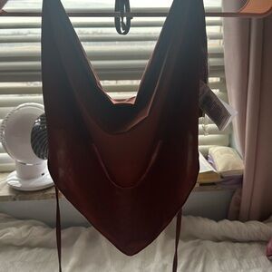 Never worn, cotton on brand, size small, banana tie top